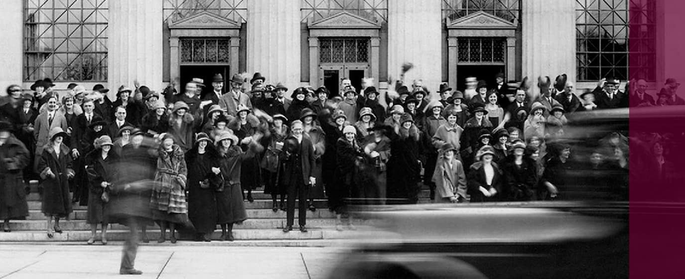 old photo of employees standing outside Lincoln Financial building