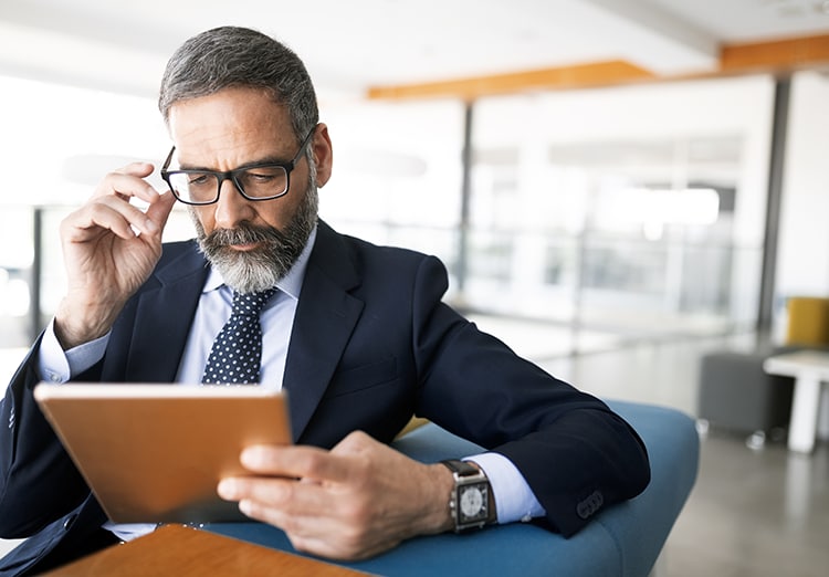 businesswoman looks at notepad