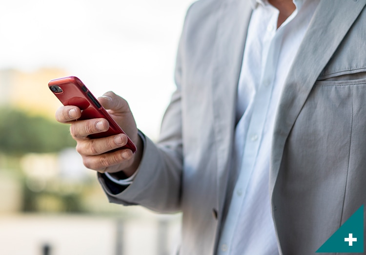 man checking smartphone