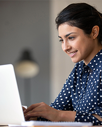 Woman works at computer