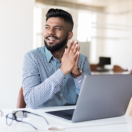 Man sitting at his laptop