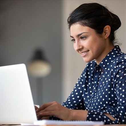 Woman works at computer