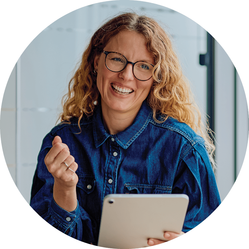 smiling woman with a digital tablet