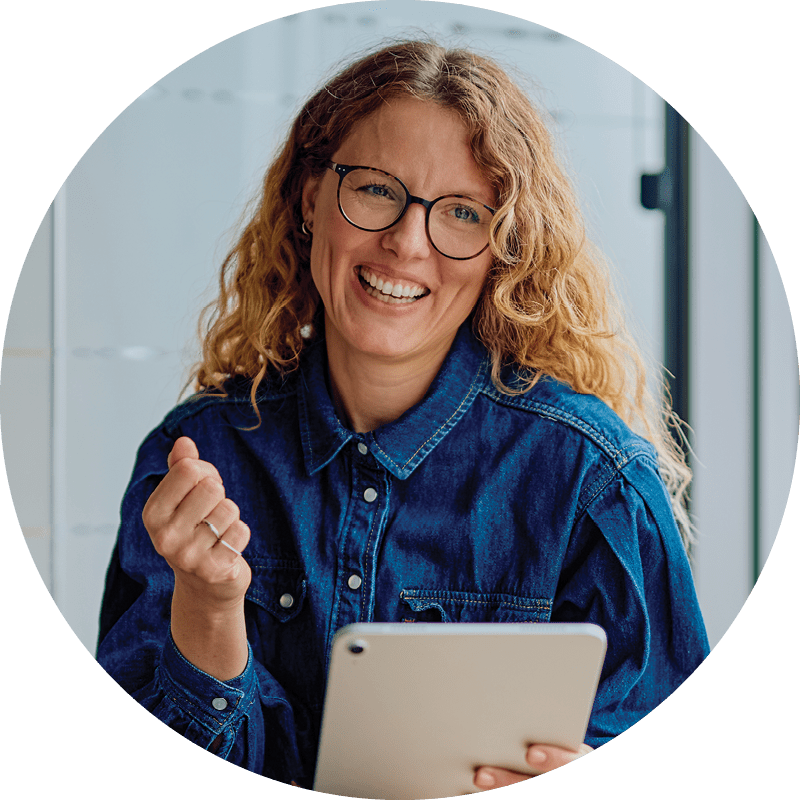 smiling woman with a digital tablet