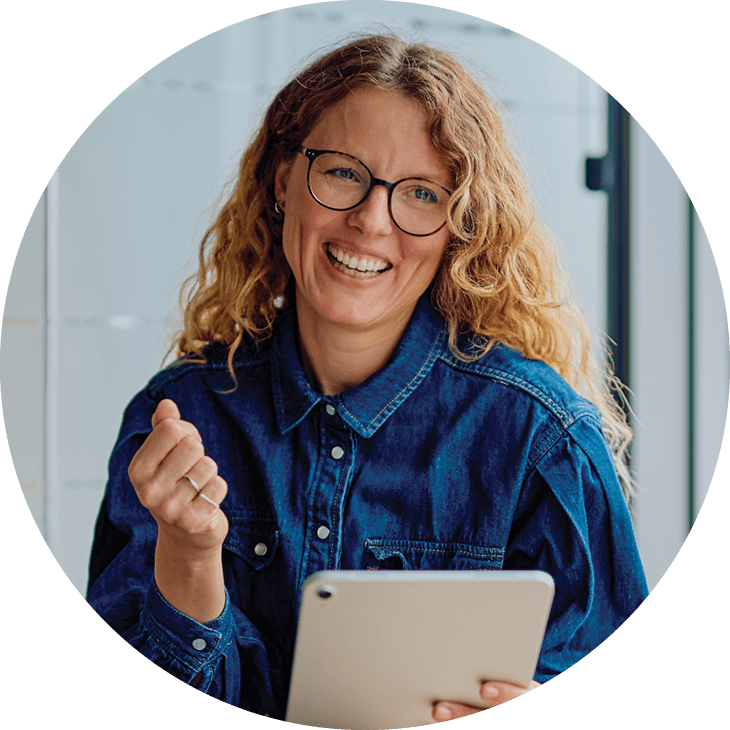 smiling woman with a digital tablet