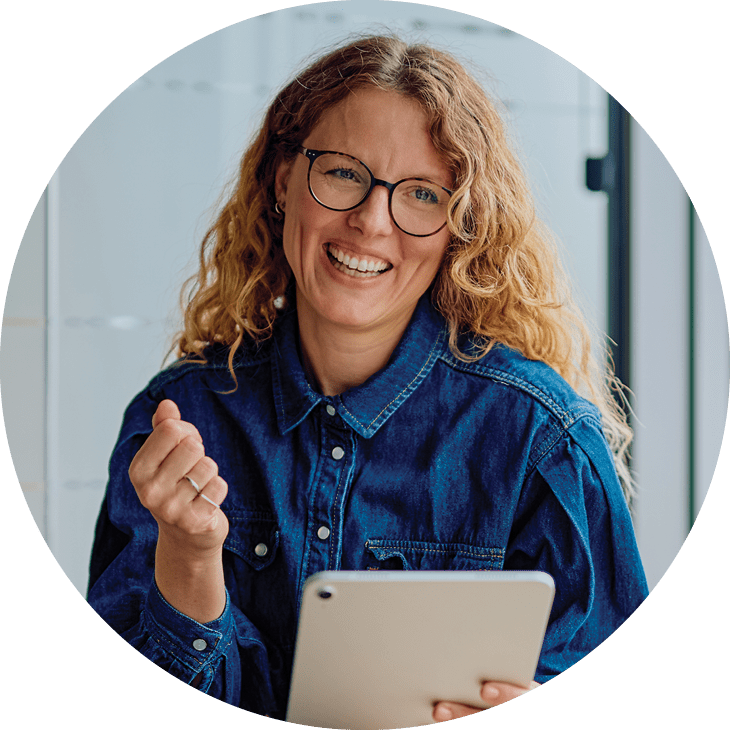 smiling woman with a digital tablet