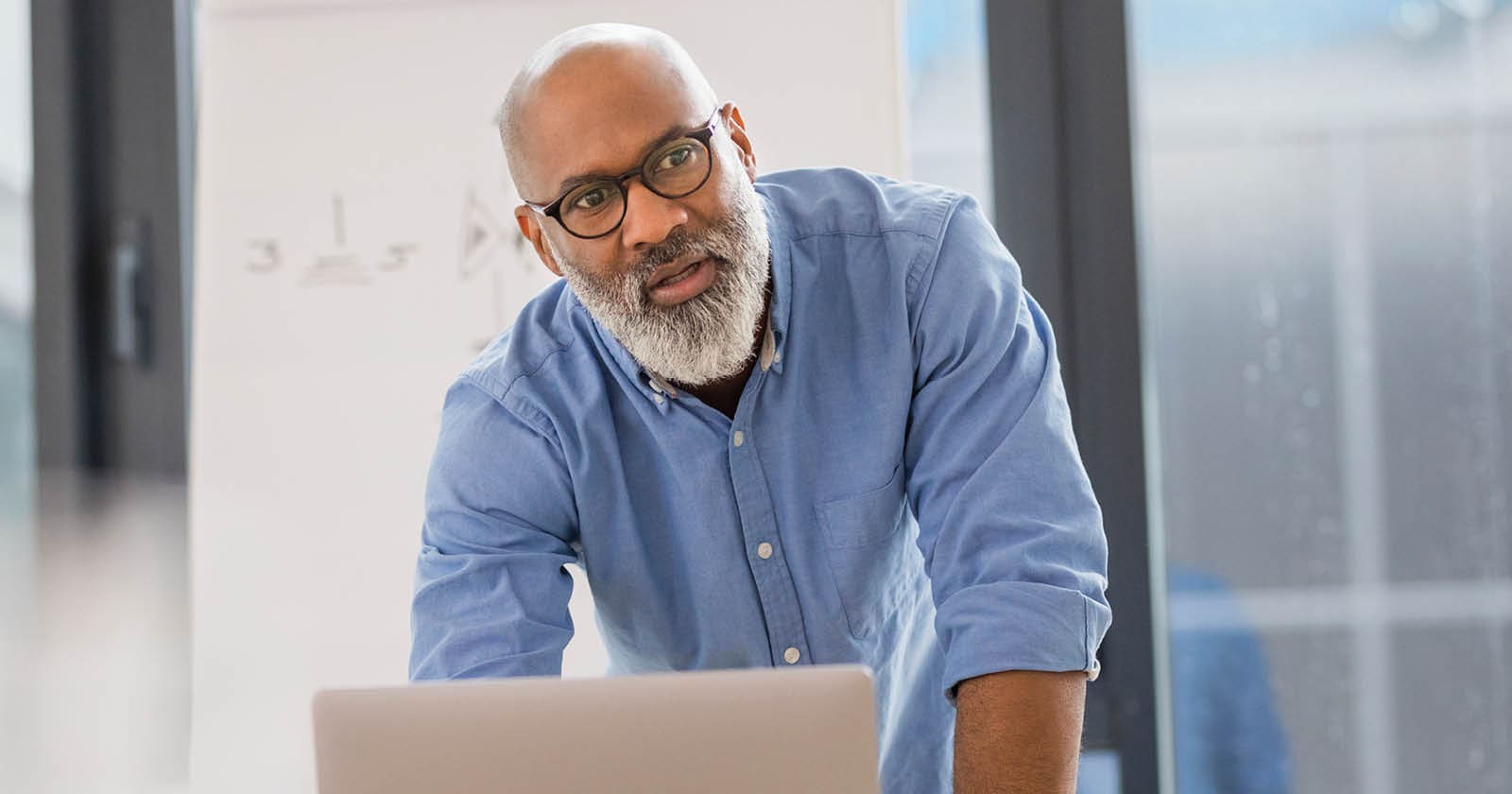 man working at laptop