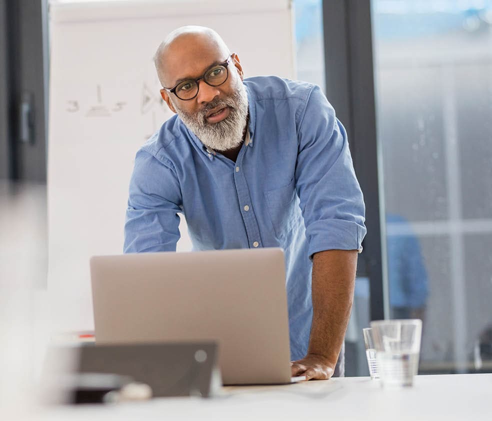 man working at laptop