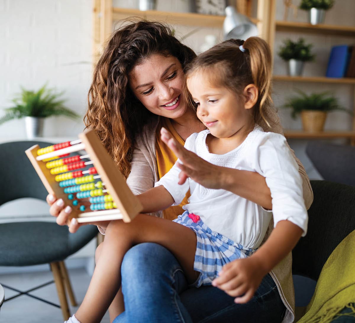 teacher working with a student