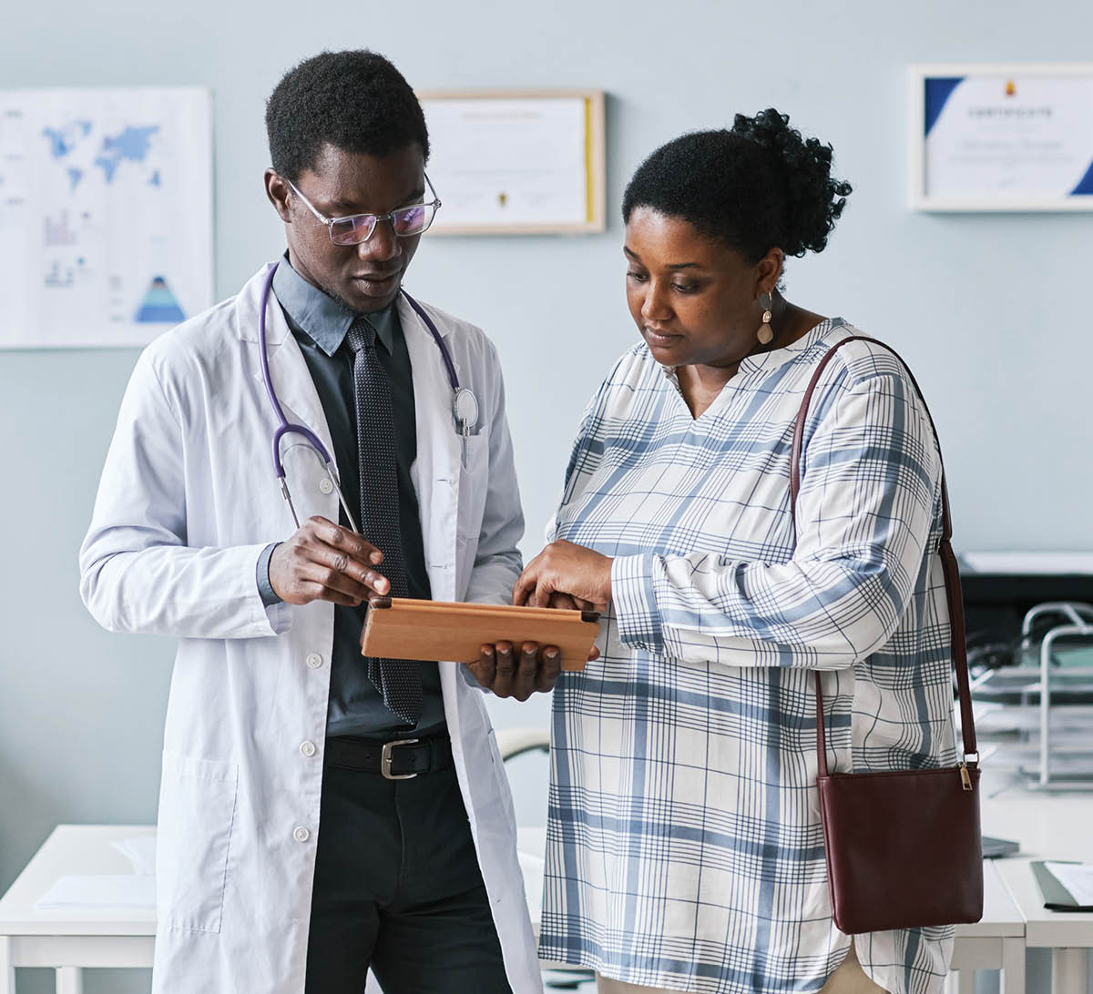 doctor reviewing notes with patient