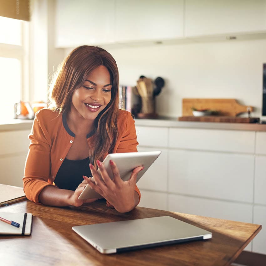 Woman working on an electronic tablet