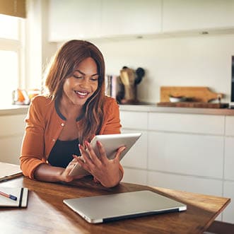 Woman working on an electronic tablet