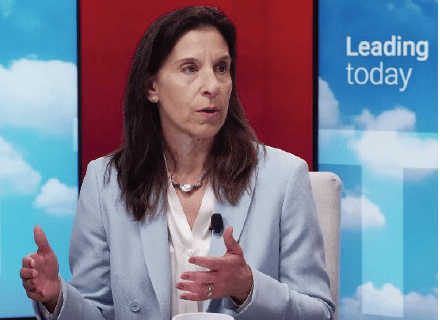 Ellen Cooper conversing in studio