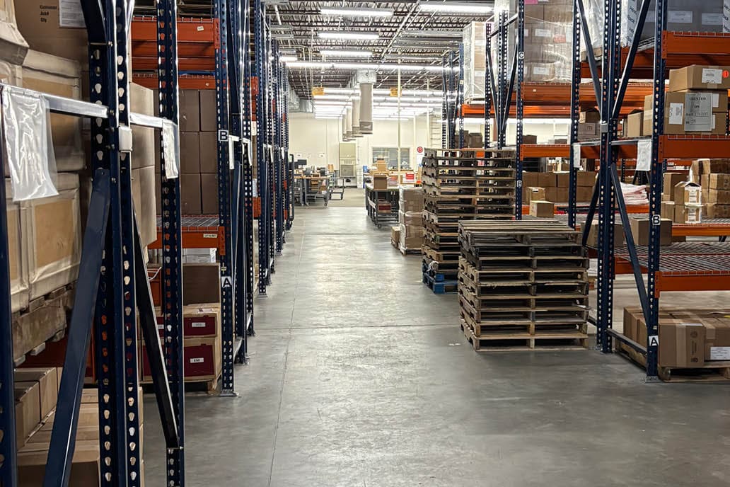 A large warehouse with shelves full of boxes and crates. AI generated content