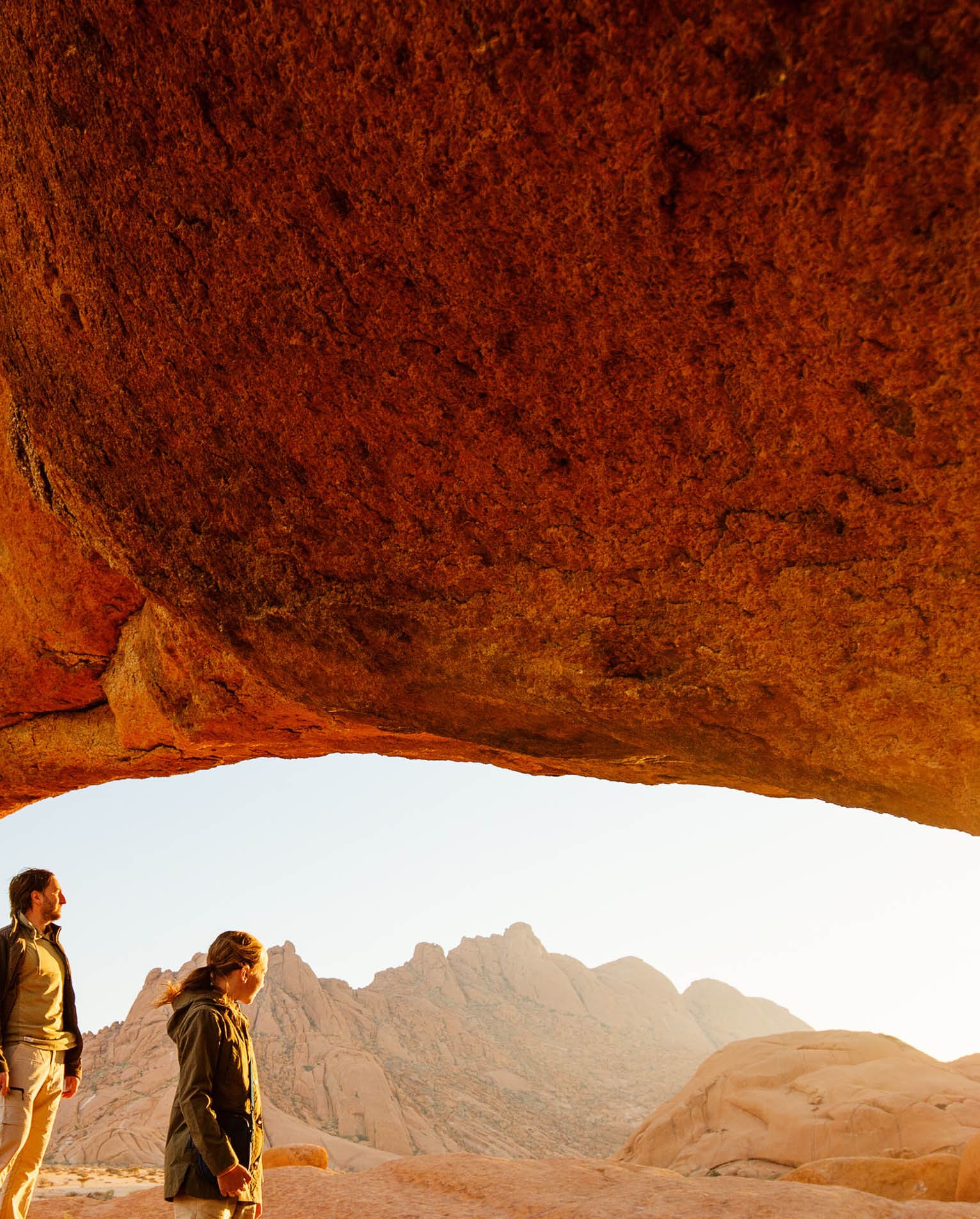 hikers looking at rock formations