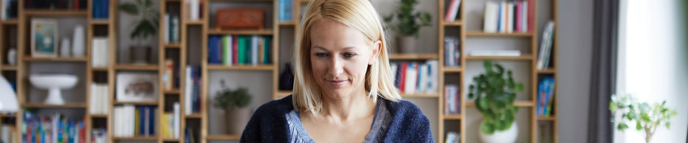 Woman submitting a LincXpress ticket on a computer