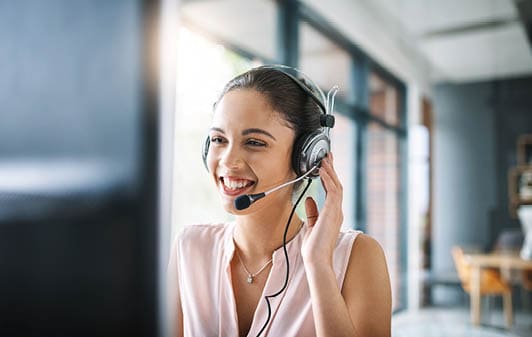 Cropped shot of an attractive young woman working in a call center