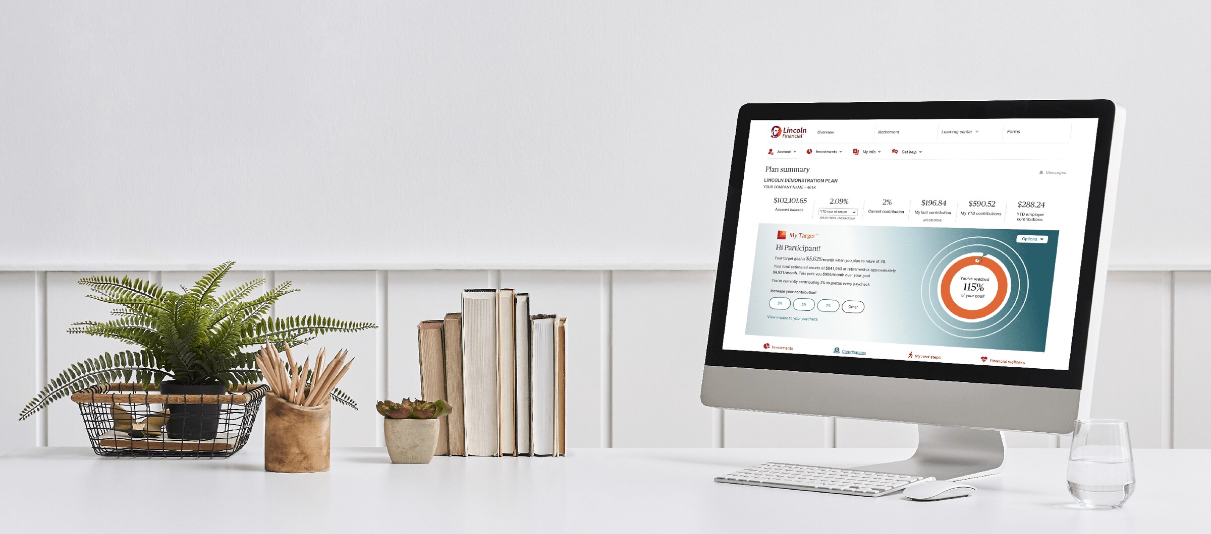 desktop computer with participant online account on screen