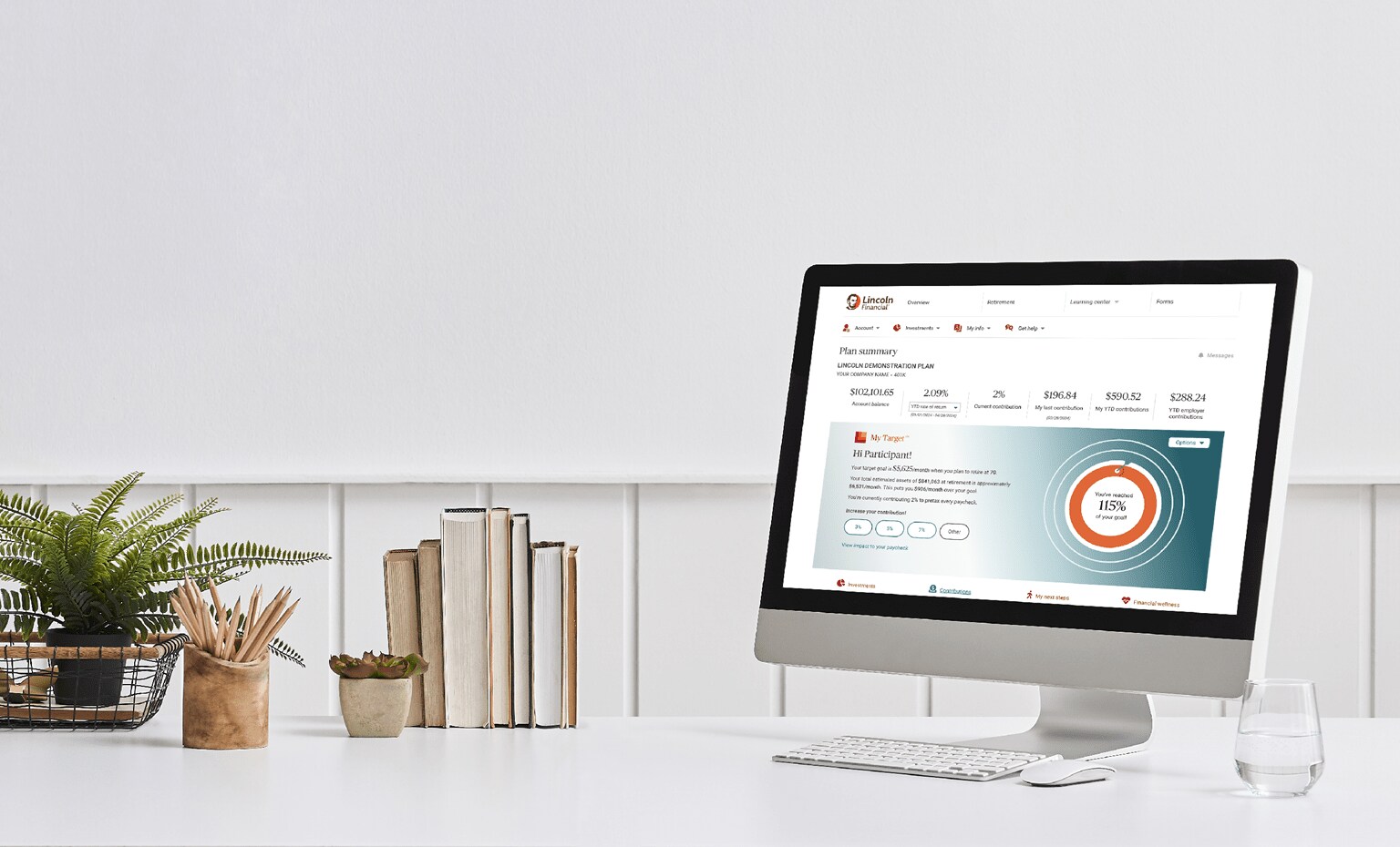 desktop computer with participant online account on screen