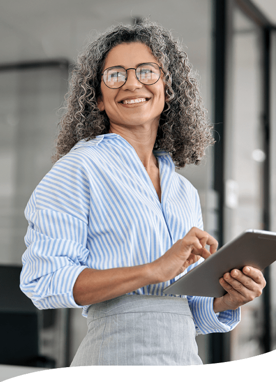 smiling woman holding an electronic tablet