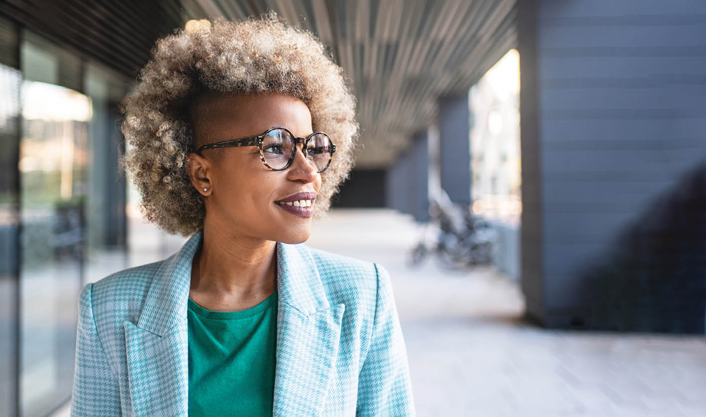 smiling woman looking off into the distance