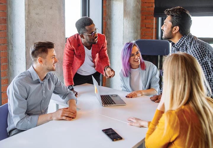 group of colleagues having a meeting in a modern office